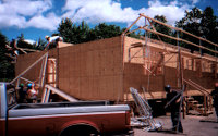 Trainees of the carpenter's union use the Genesis Safety System on a test structure.